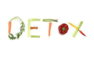 detox written with vegetables in healthy nutrition and cleaning body toxins concept